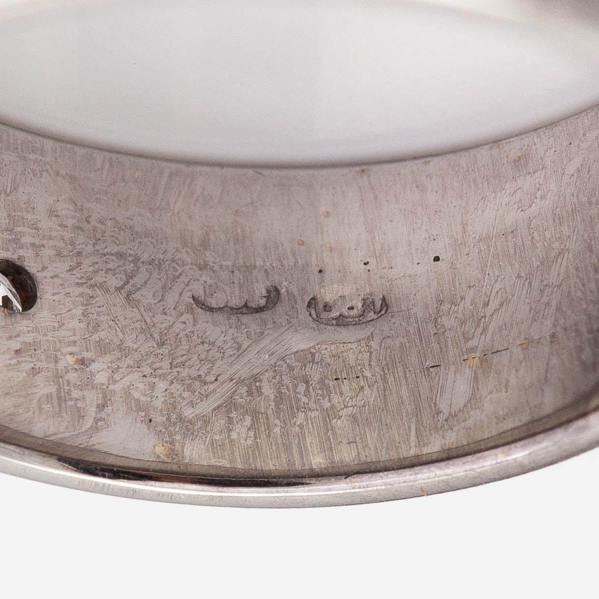 A 14K white gold ring with diamonds ca. 0.15 ct in total.