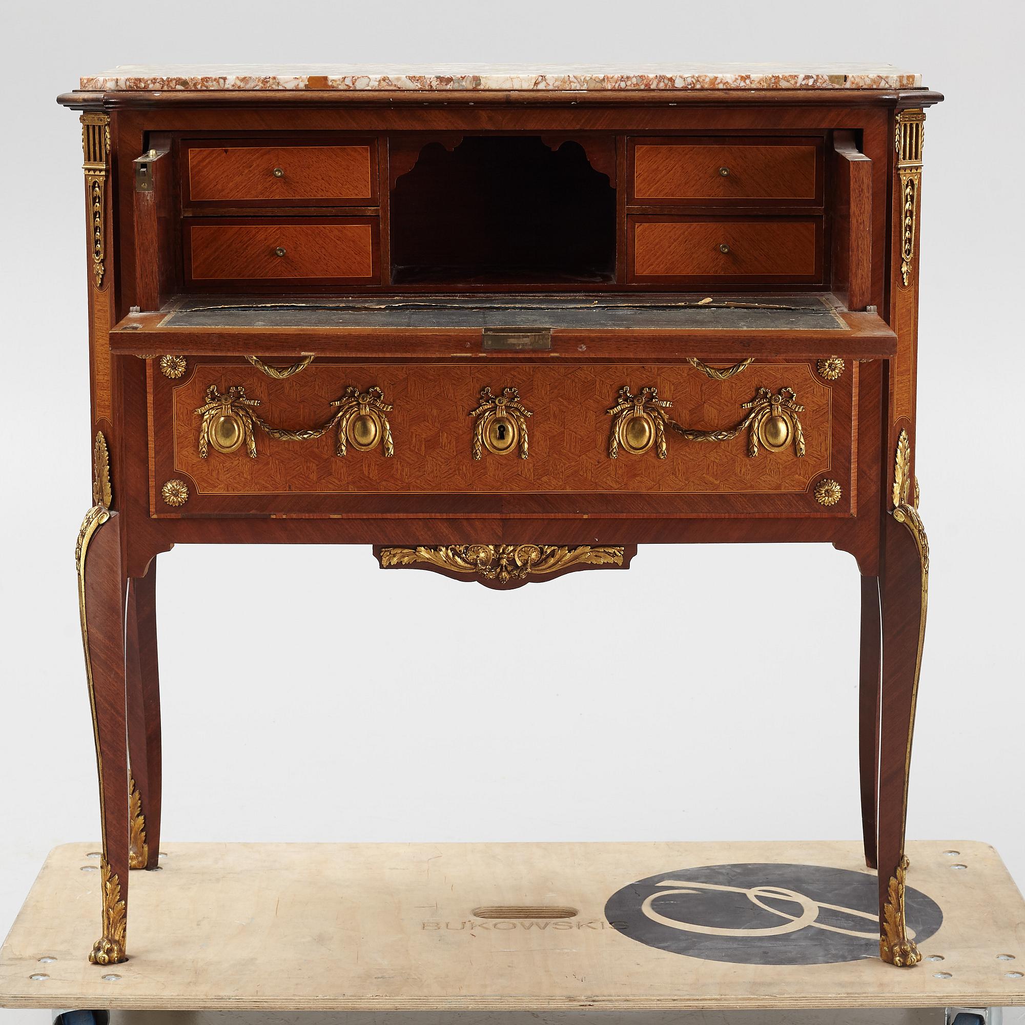 A Louis XVI-style bureau from the second half of the 20th century.