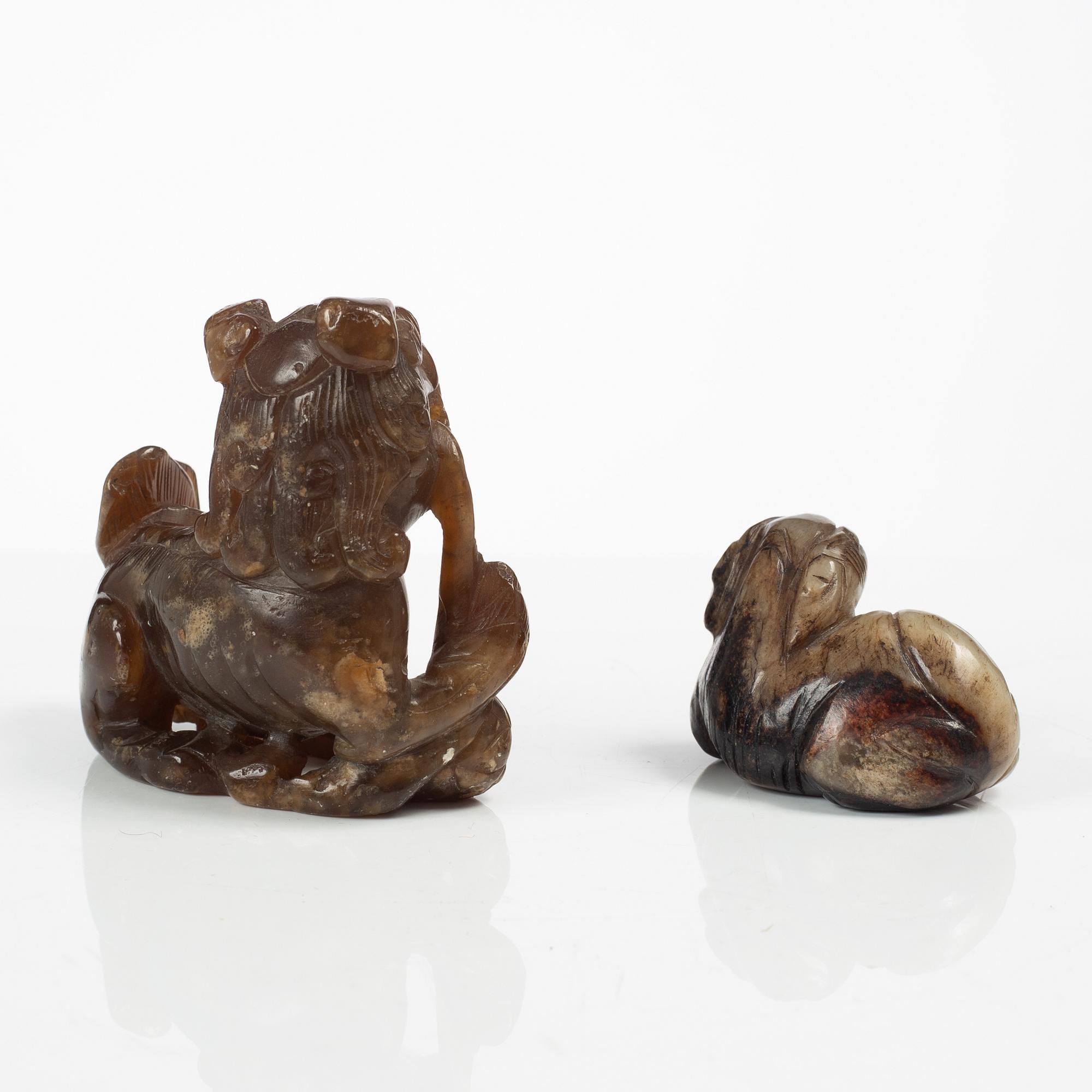 A group of two Chinese stone figures and a stone plaque, late Qing dynasty/early 20th century.