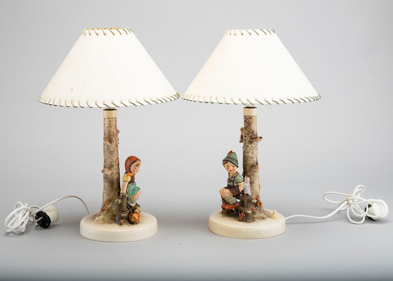 MARIA INNOCENTIA HUMMEL, a pair of porcelain lamps.