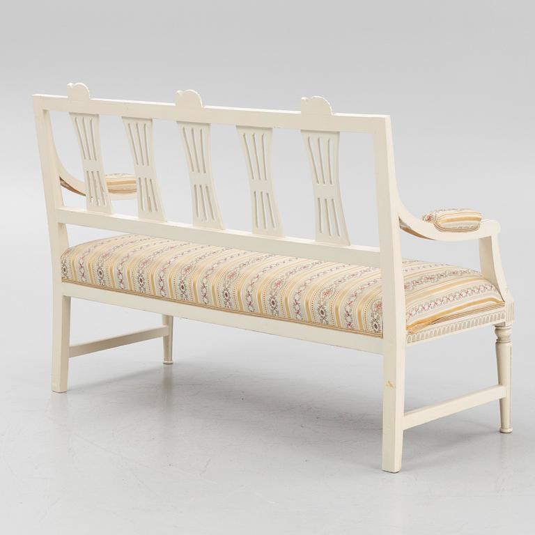 A sofa, three chairs and a table, Gustaivan style and of the Gustavian period, 19th-20th century.