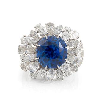 A platinum ring set with a faceted sapphire.