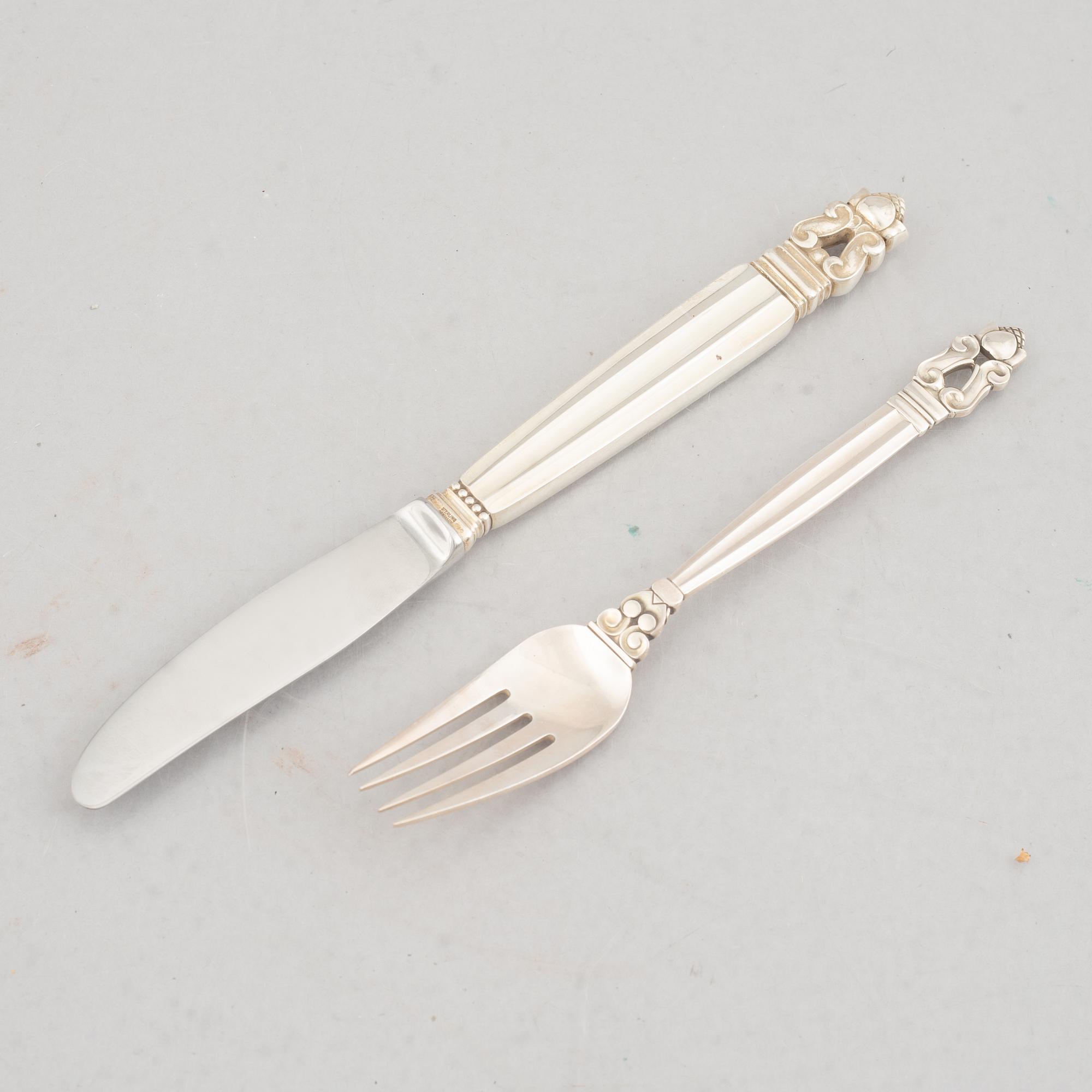 Johan Rohde, a 63-piece sterling silver flat wear set, "Konge"/"Acorn", Georg Jensen, Denmark.