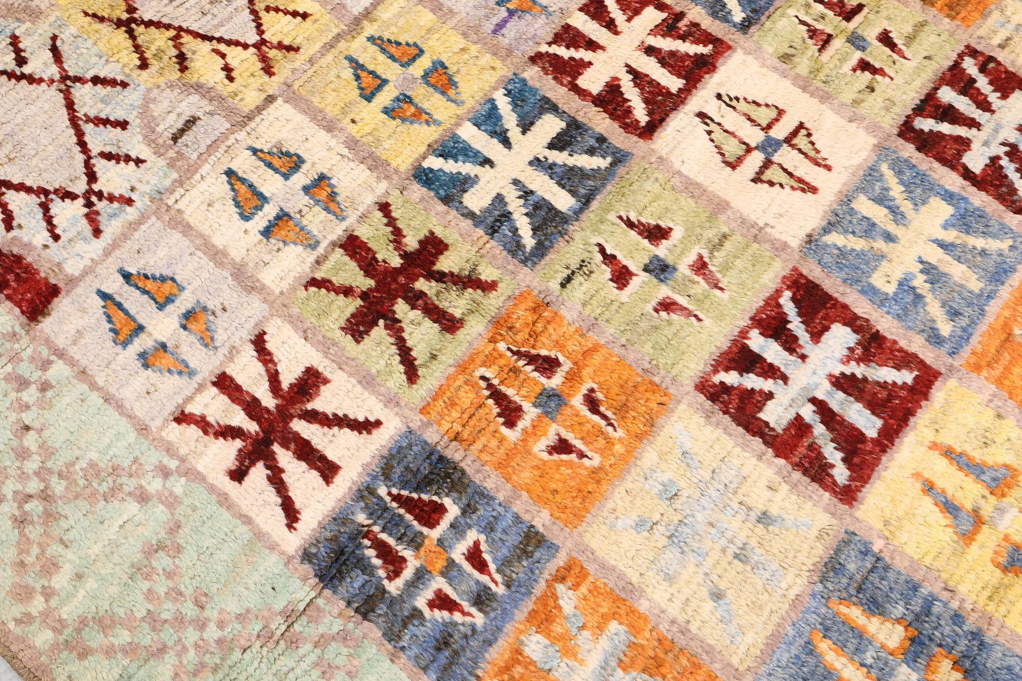 A Moroccan design carpet, c. 299 x 198 cm.