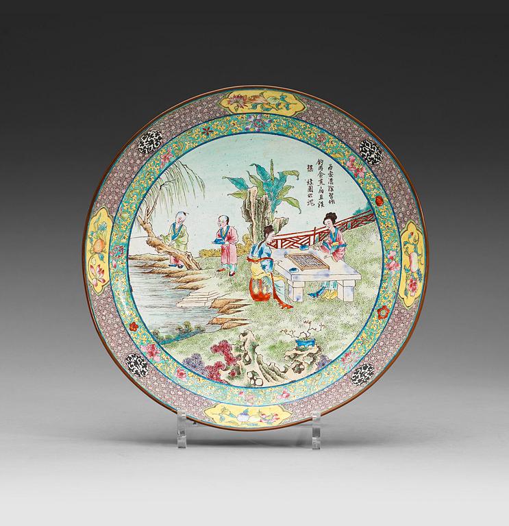 An enamel on copper dish, Qing dynasty 18th century.
