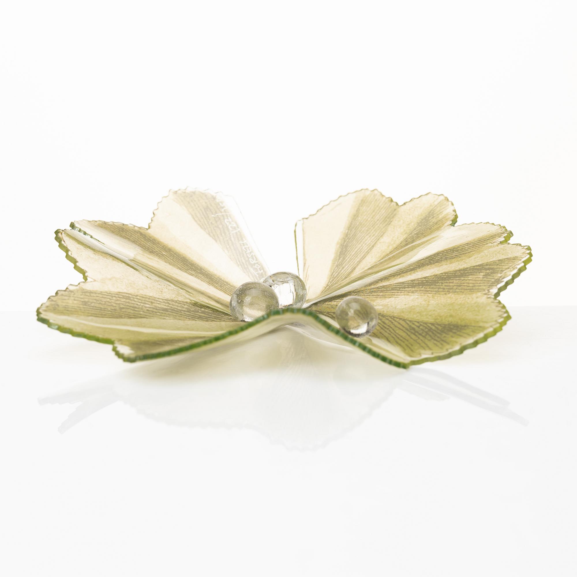 Ulla Forsell, a glass sculpture of a leaf with with three glass drops, ca 2013, ed. 122/150.