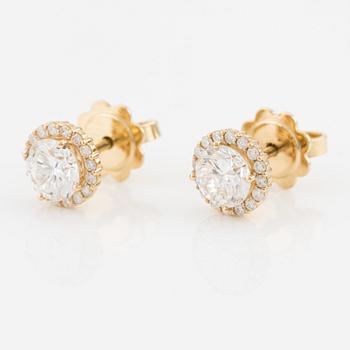 Earrings with brilliant-cut diamonds, including IGI report.