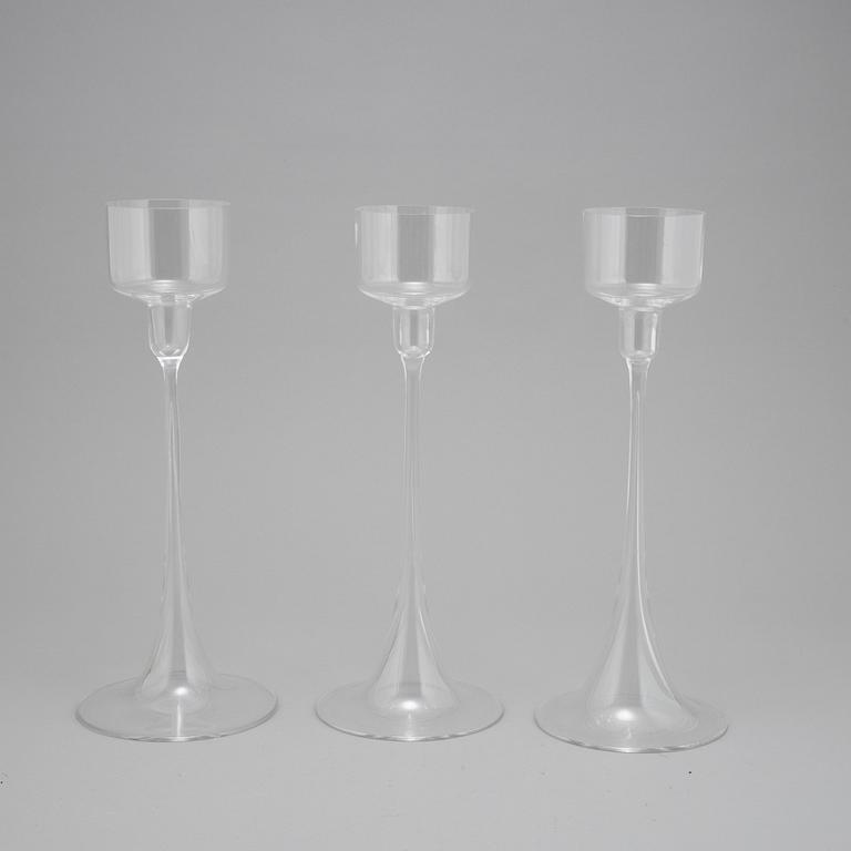 Ingeborg Lundin, a set of three glass candlesticks, Orrefors.