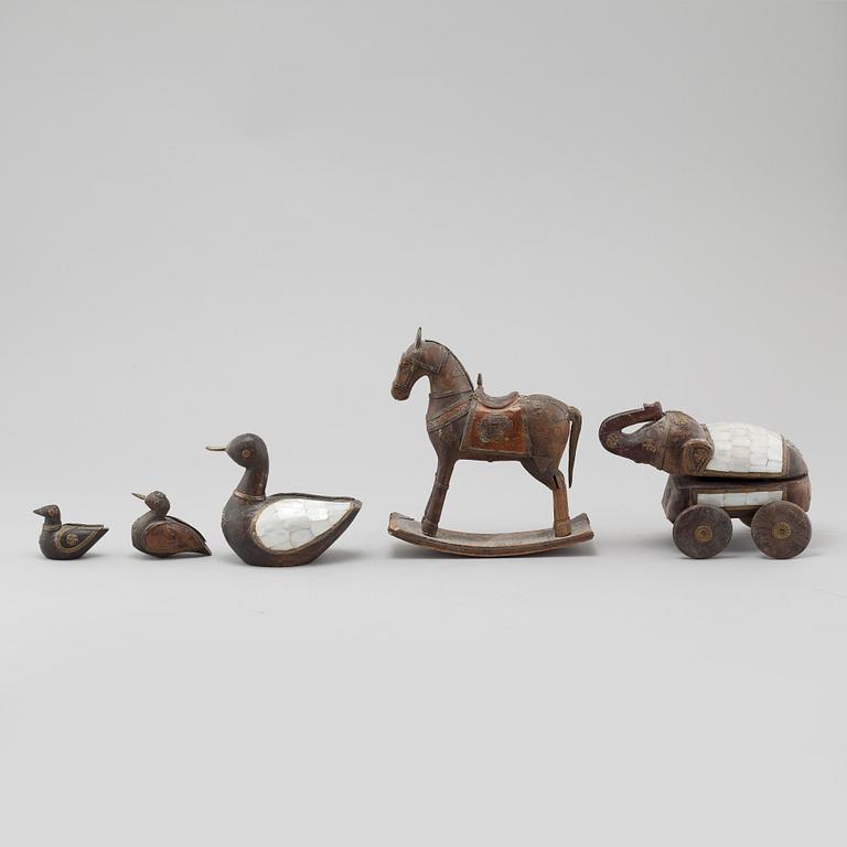 Five wooden toys from the latter half of the 20th century.