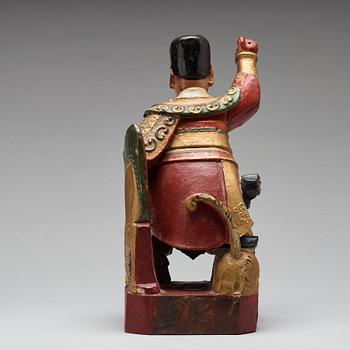 A lacquered wooden figure, Qing dynasty, 19th century.