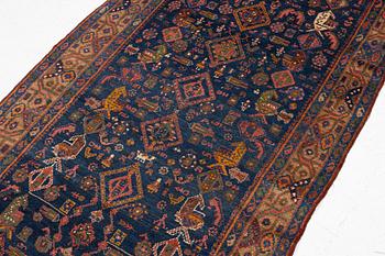 A semi-antique Northwest Persian runner, c. 388 x 94 cm.