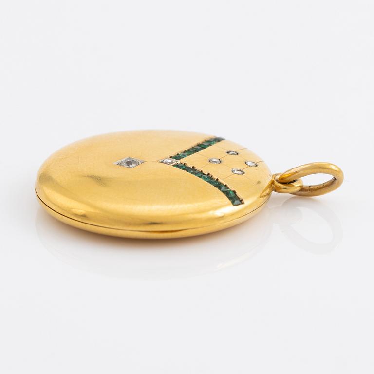 18K gold, emerald and diamond locket pendant.