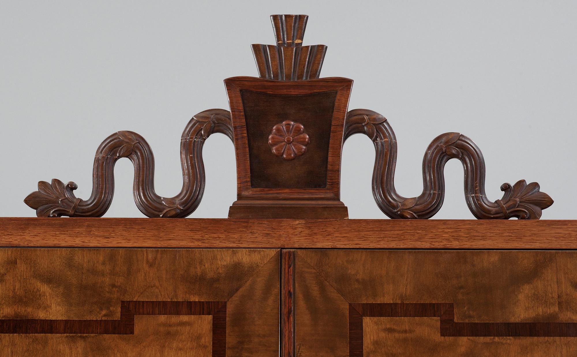 A Gösta Thorell Swedish Grace cabinet in stained birch, palisander, mahogany and other wood inlays, Stockholm 1930.