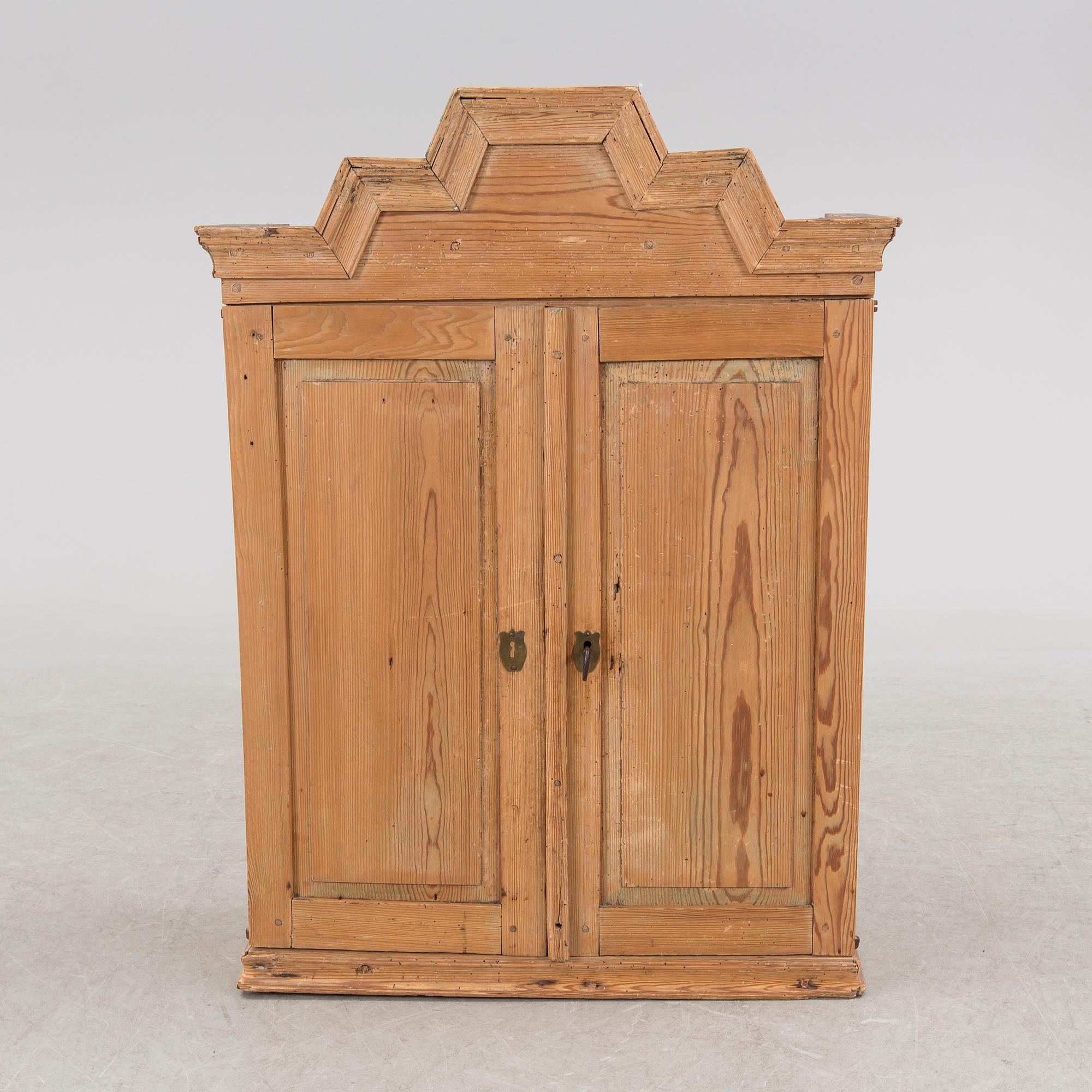 A first half of the 19th century cabinet.