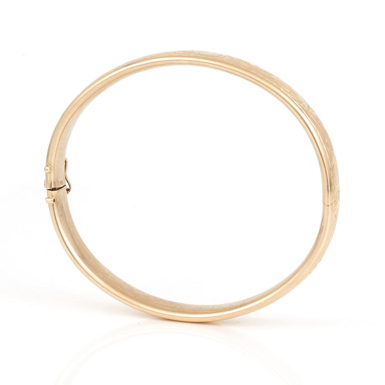 ARMRING med graverad dekor.