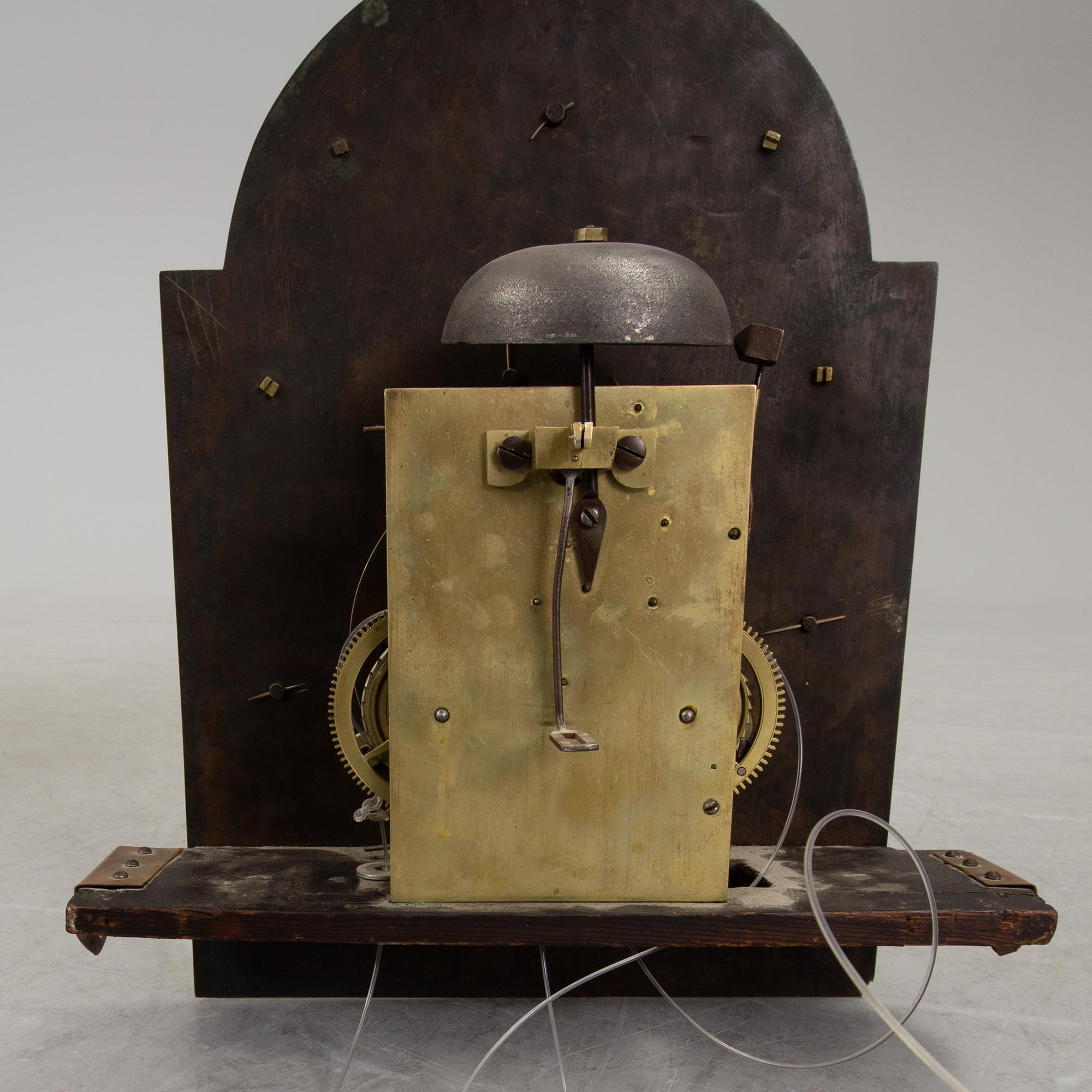 A mahogany veneered grandfather clock by John Parkes London.