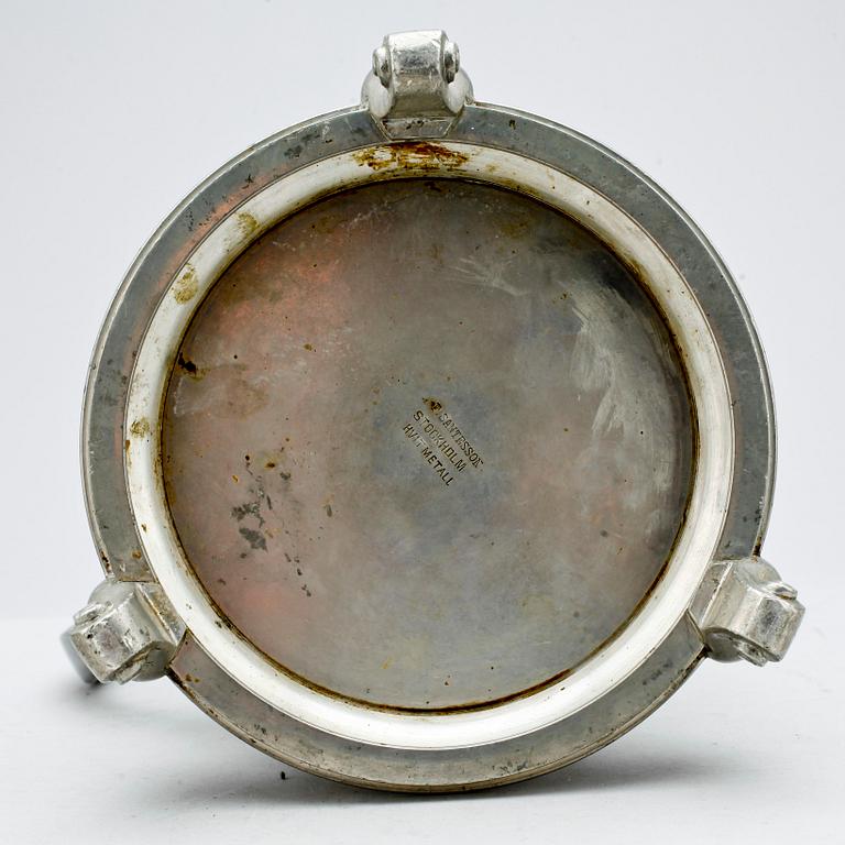 KANNA, tenn, F Santesson, Stockholm, omkring 1900.