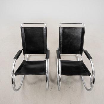A pair of Fasem leather and chrome rocking chairs Italy later part of the 20th century.