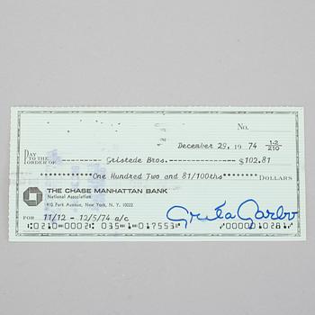 GRETA GARBO (1905-1990), egenhändigt signerad check, daterad Dec 29, 1974.