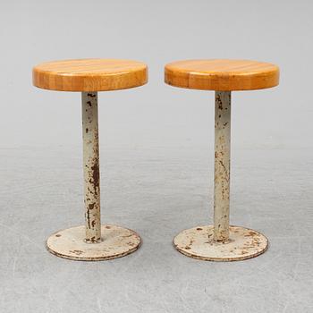 A pair of mig 20th century stools.