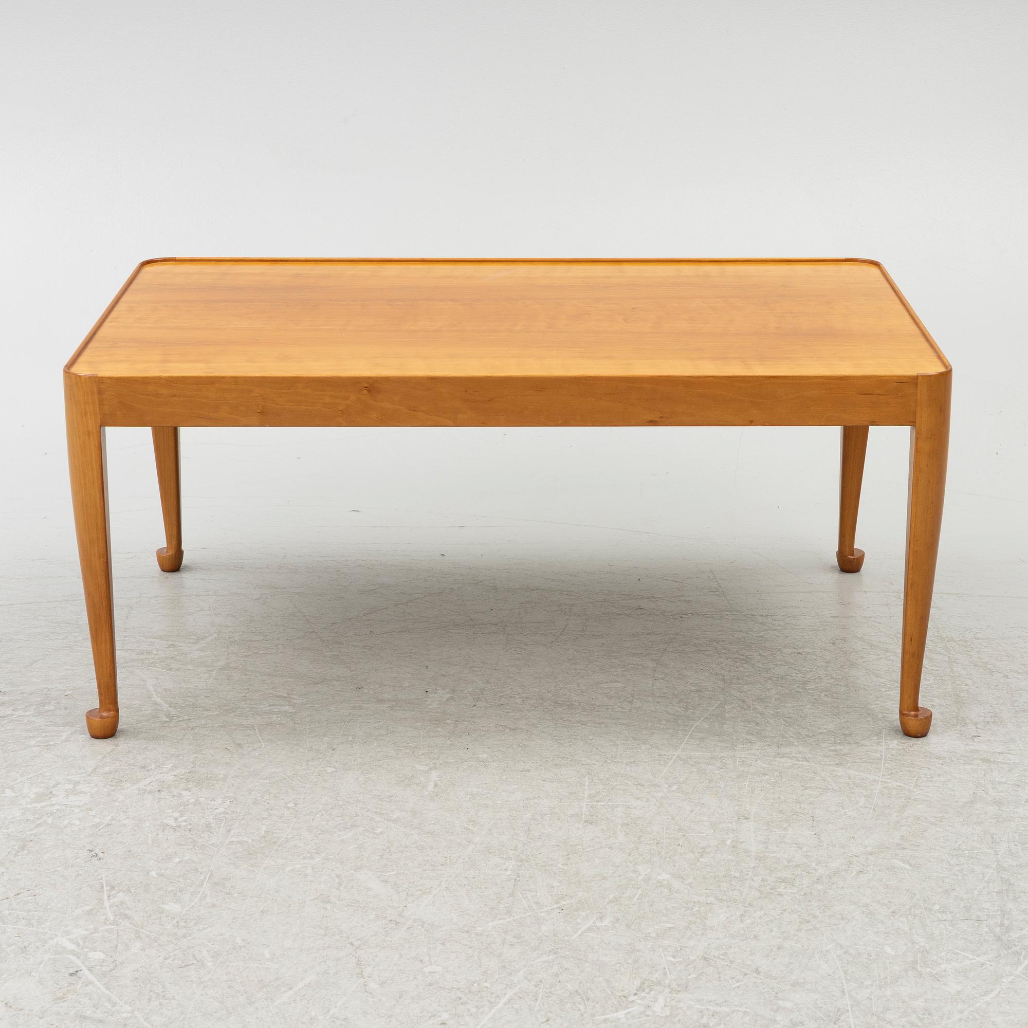 Josef Frank, a model B 2073 coffee table, 'Diplomat', Firma Svenskt Tenn, Sweden.