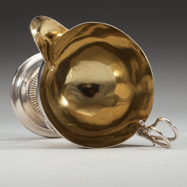 A Swedish 19th century parcel-gilt cream-jug, marks of Adolf Zethelius, Stockholm 1813.