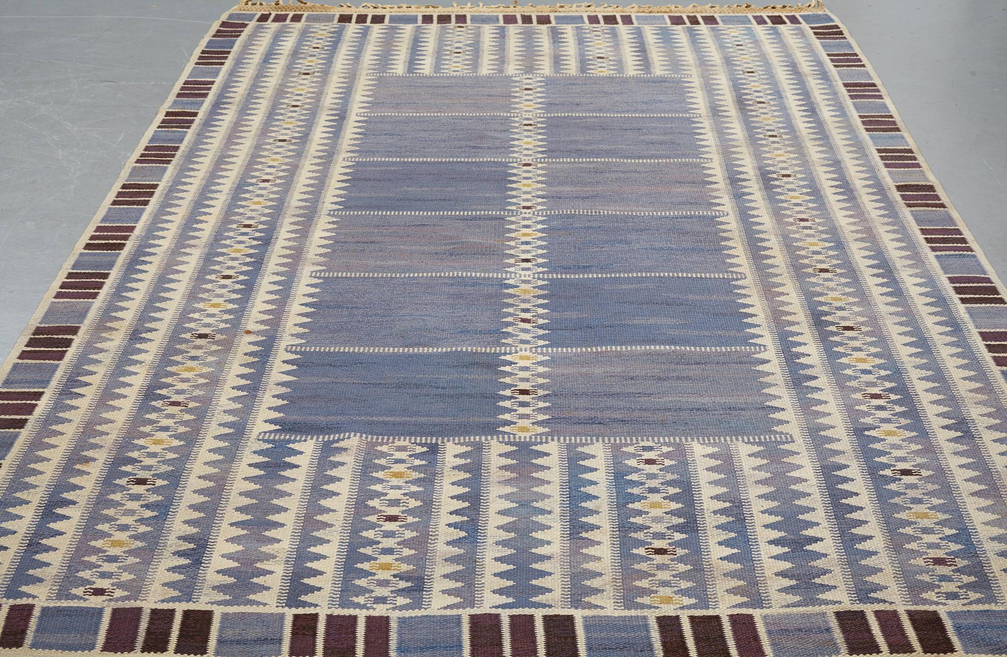 Barbro Nilsson, a carpet, "Salerno blå", flat weave, ca 312 x 201,5-205,5 cm, signed AB MMF BN.