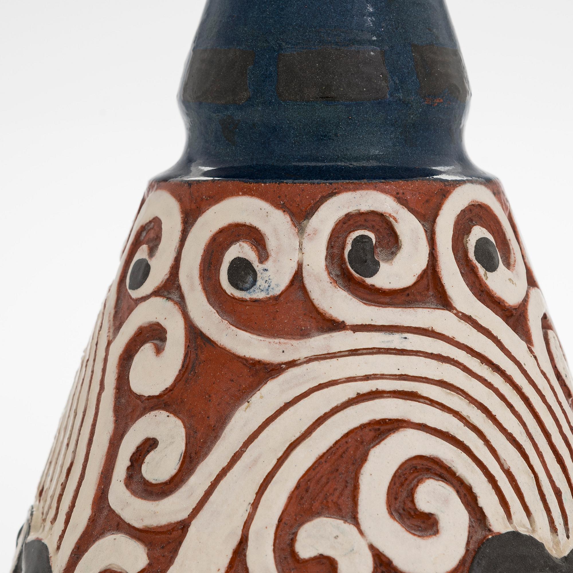 Sigrid Wickström-Paaer, a red clay vase signed SW and dated 1908.