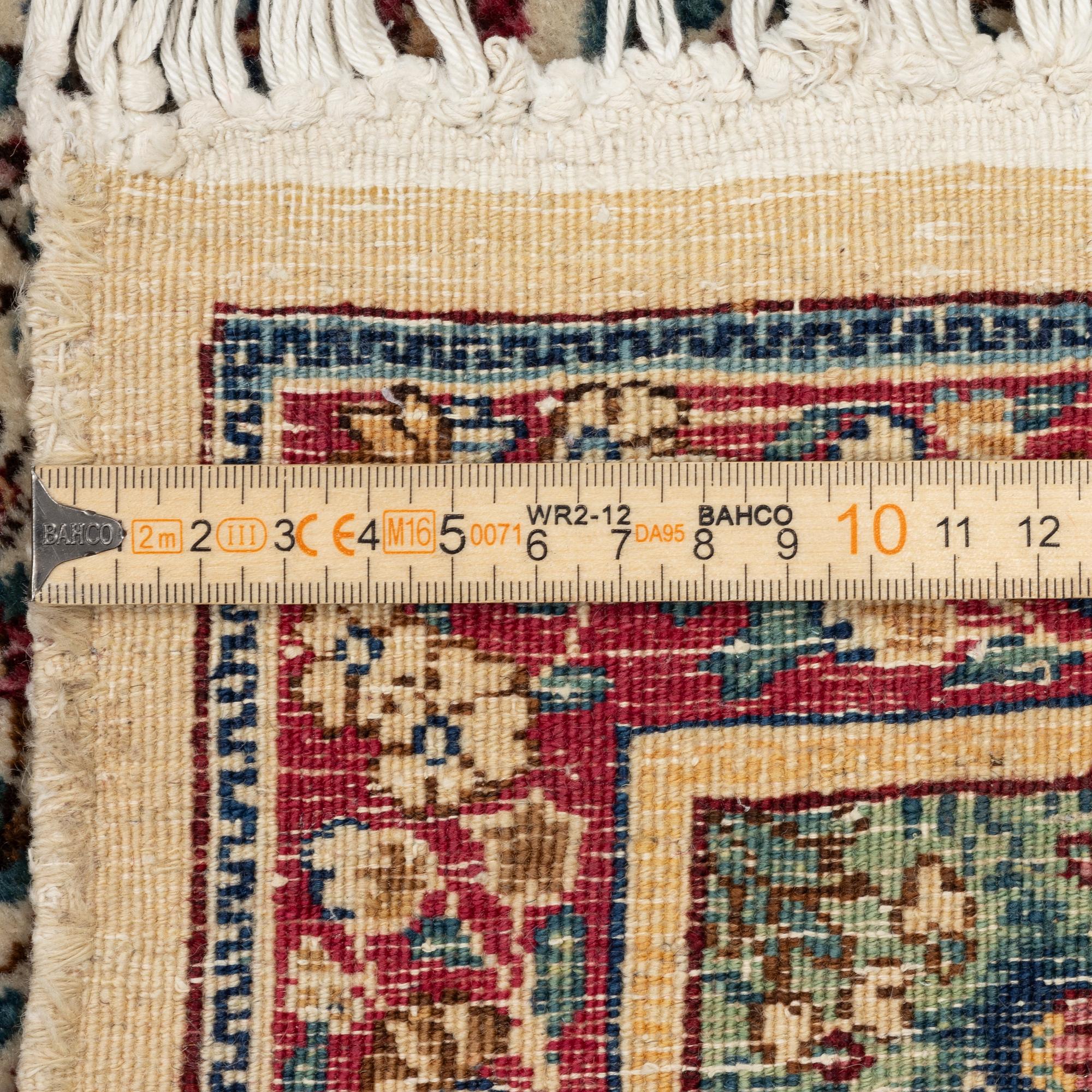 Rug, Kirman Millefleur, approx. 250 x 150 cm.