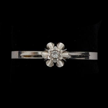 RING, 18k viktguld med briljantslipad diamant ca 0,01 ct. Vikt ca 2 gram.