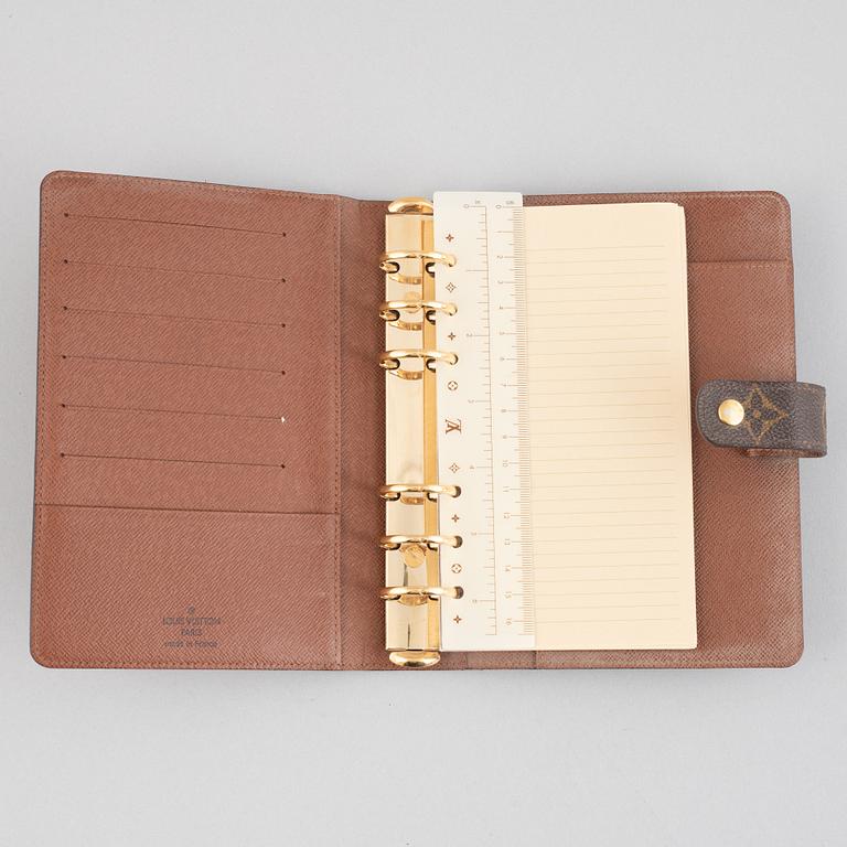 Louis Vuitton, plånbok och kalender.