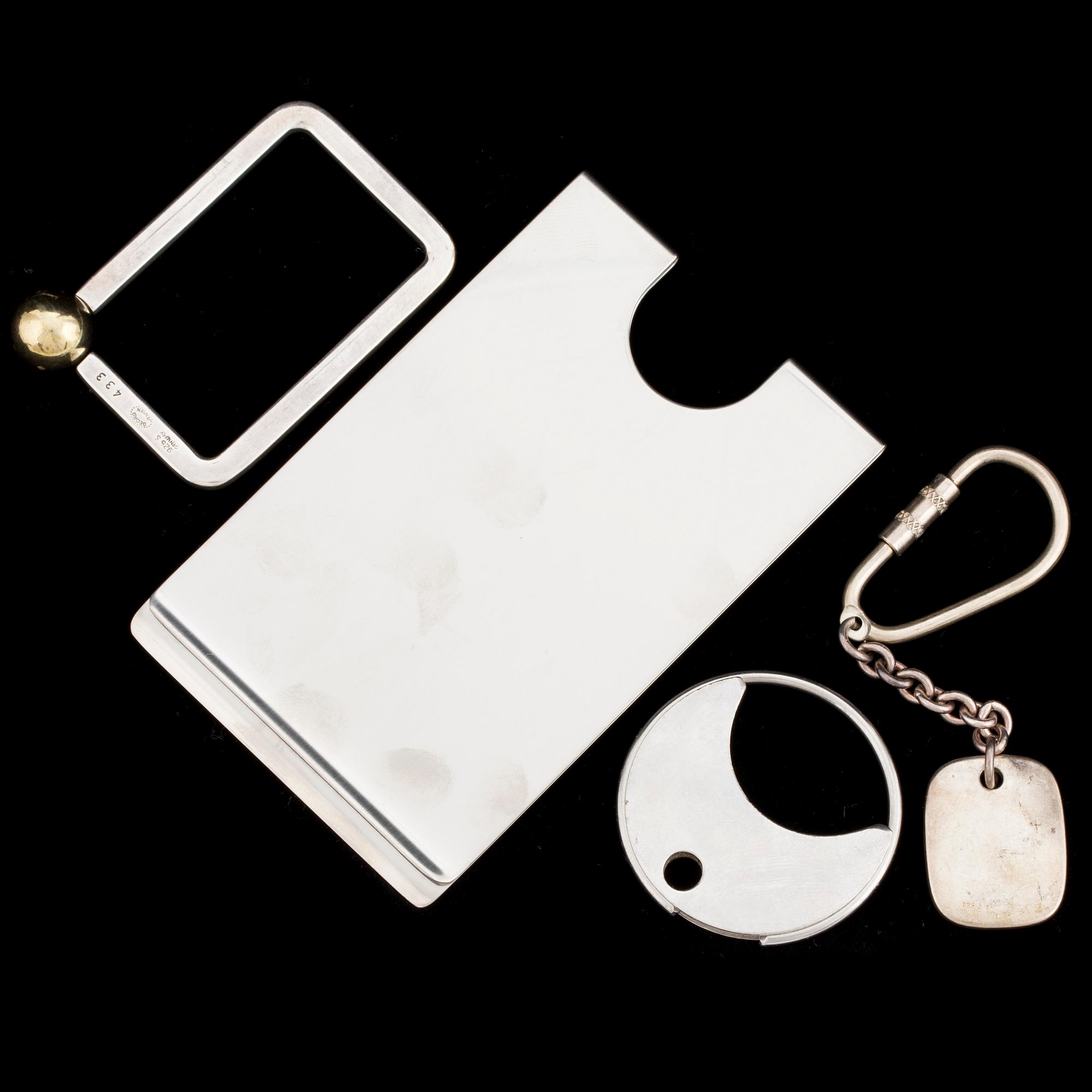 Three key ring and a credit card holder by GEORG JENSEN, late 20th century.