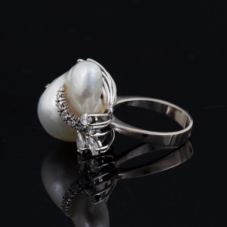 Baroque pearl and navette-cut and brilliant-cut diamond ring.