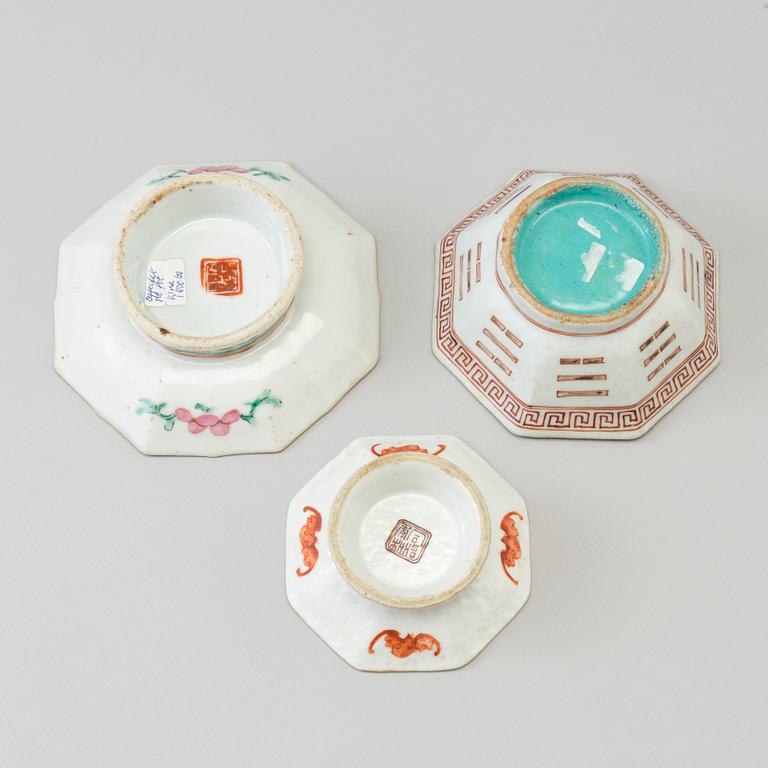Two Chinese famille rose 'tri-gram' patterned footed dishes and one bowl, early 20th century.