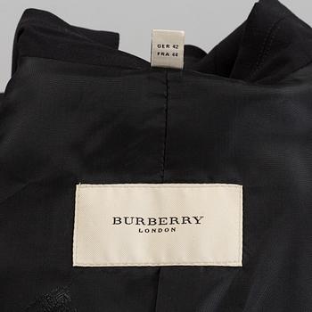 An Burberry suit, in size 42.