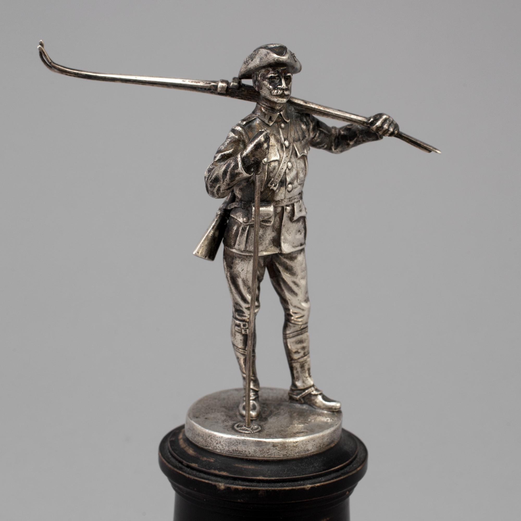 A Swedish silver figurine from CG Hallberg in Stockholm with unclear hallmarks.