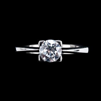 61. A RING, brilliant cut diamond c. 0.85 ct and small diamonds c. 0.30 ct in total.