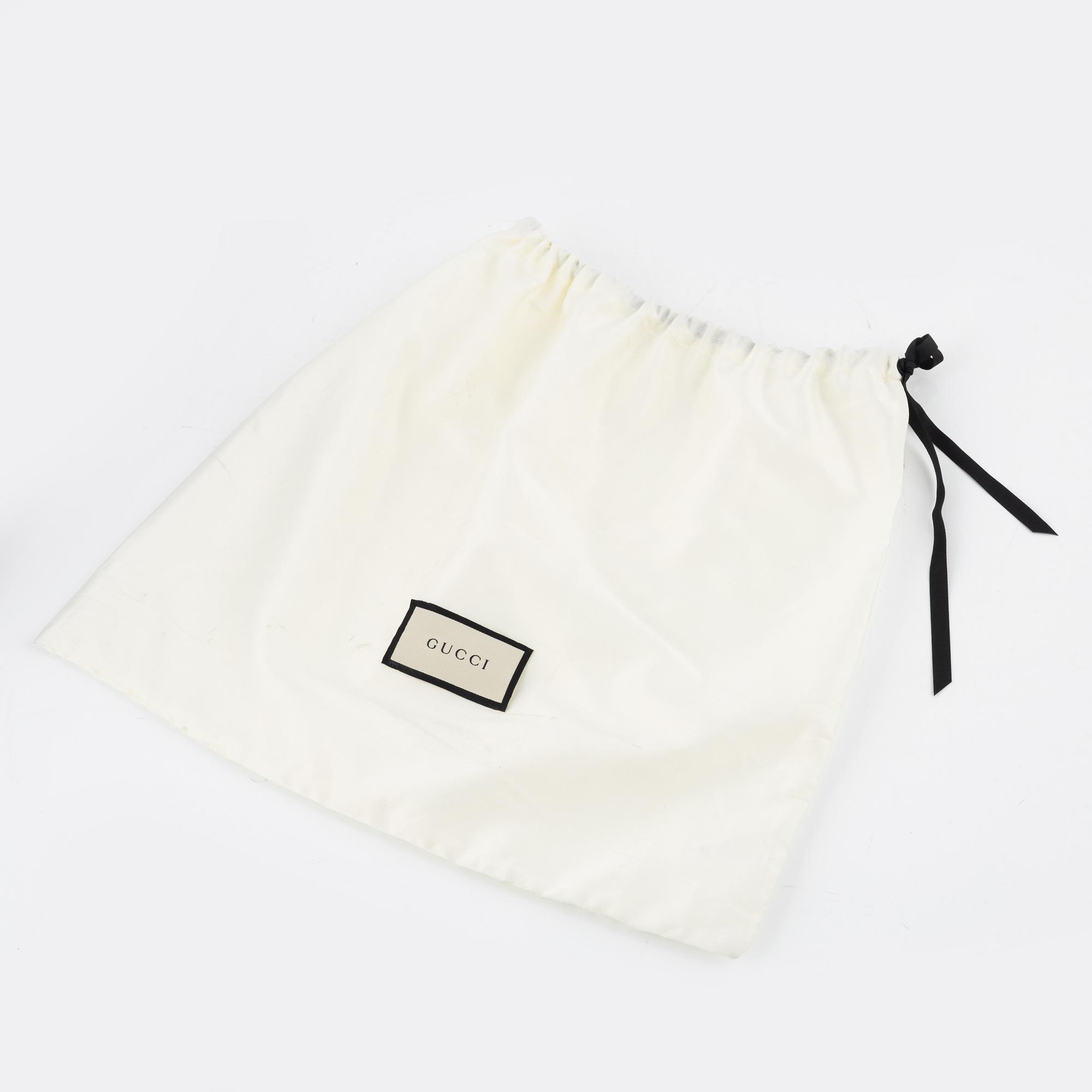 Gucci, a belt bag.