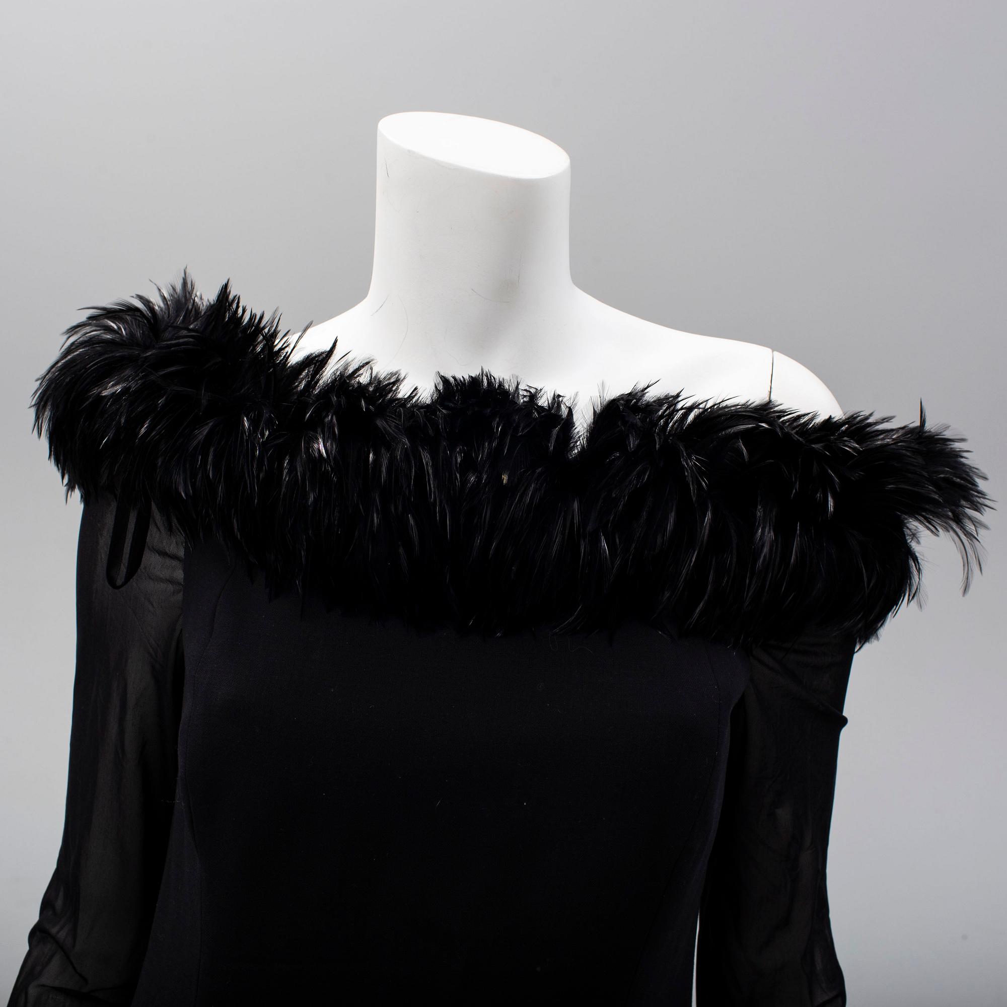 ESCADA COUTURE, a wool dress with feather collar, size 40.