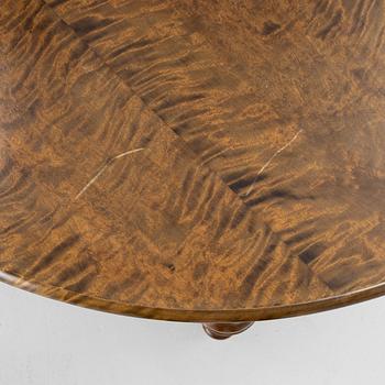 Dining table, circa 1900.