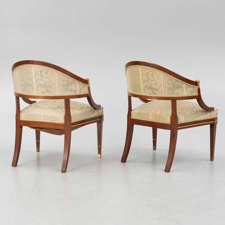 A sofa, two armchairs, four chairs and table, Empire style, 20th century.