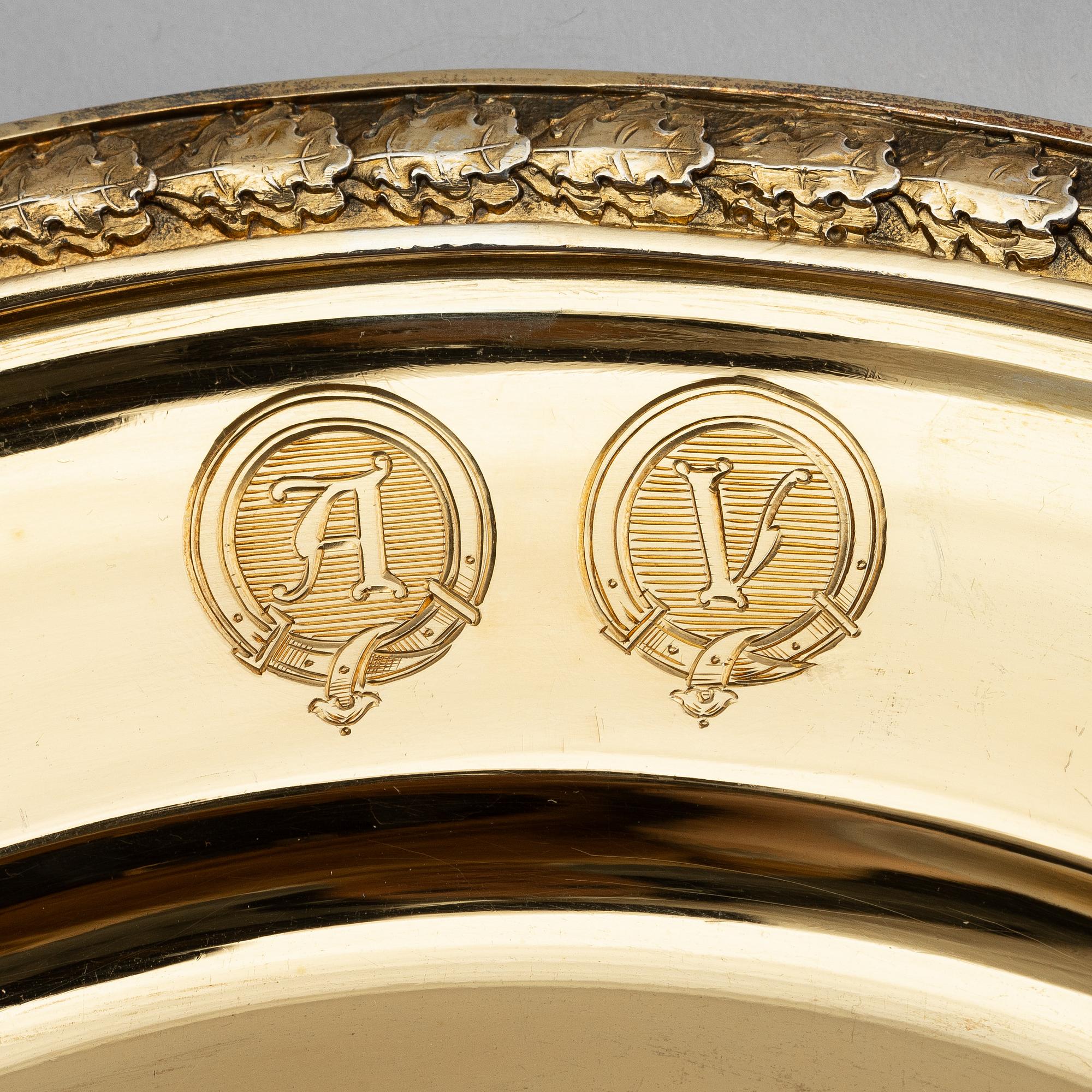 Twelve silver-gilt plates, mark of company C.G. Hallberg, Stockholm 1913-1917.