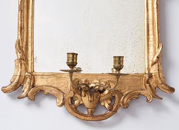 A pair of Danish rococo girandole mirrors.