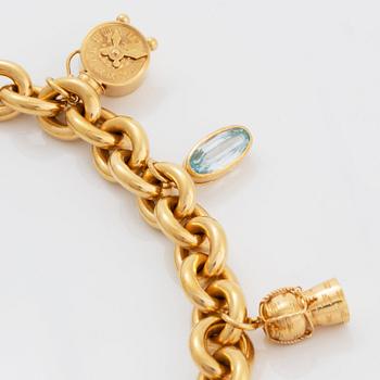 An 18k gold charm necklace.