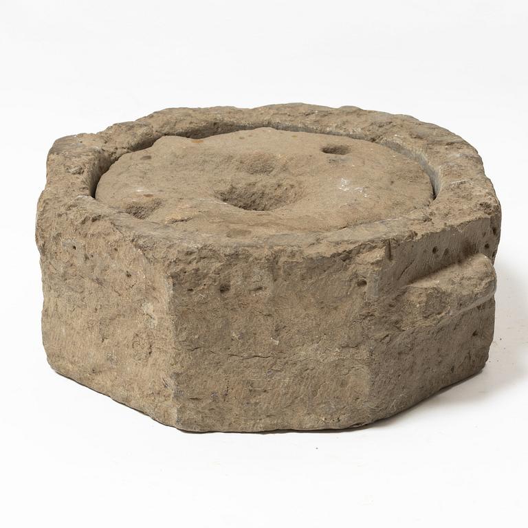 A Swedish grain mill, dated 1673.