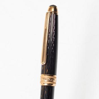 A Mont Blanc Meisterstück 90th Anniversary ed.  ballpoint pen with a case.