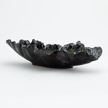 Pol Chambost, a glazed ceramic leaf shaped bowl or dish, signed.