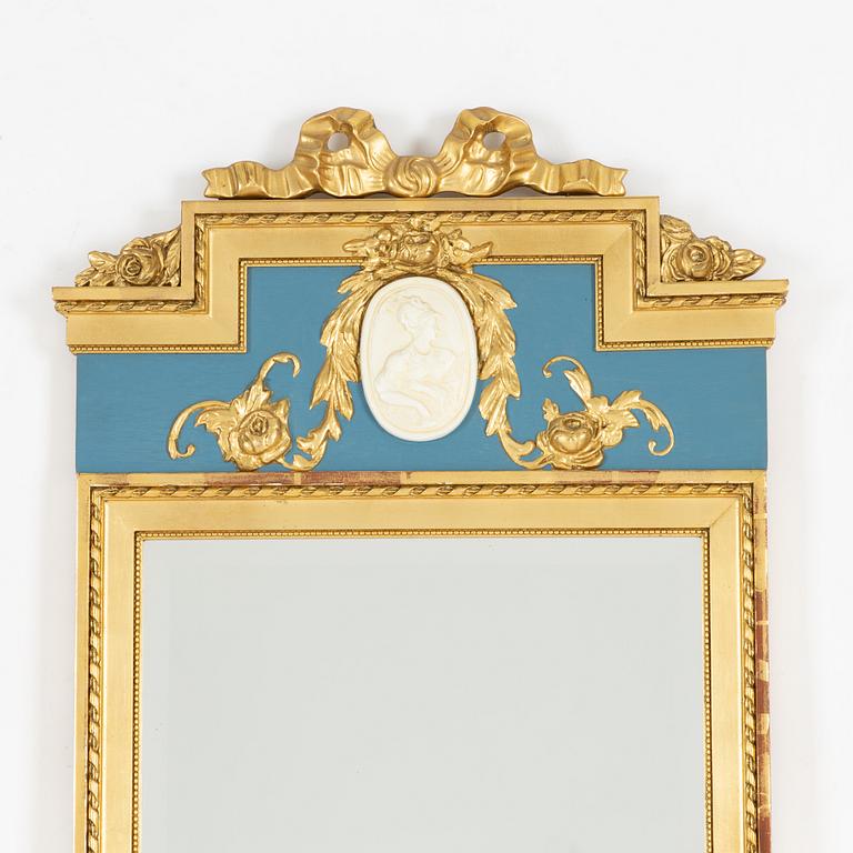 A Gustavian style console table and mirror, mid 20th century.