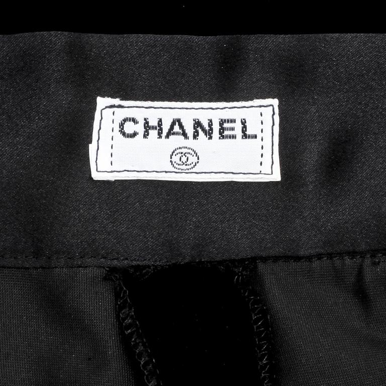 CHANEL, a pair of black velvet pants.