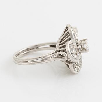 White gold and brilliant cut diamond flower ring.